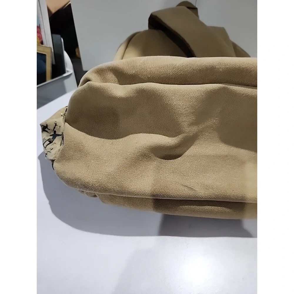 Tan Khaki Canvas Backpack Silhouette Print Multi Pocket Travel Bag
